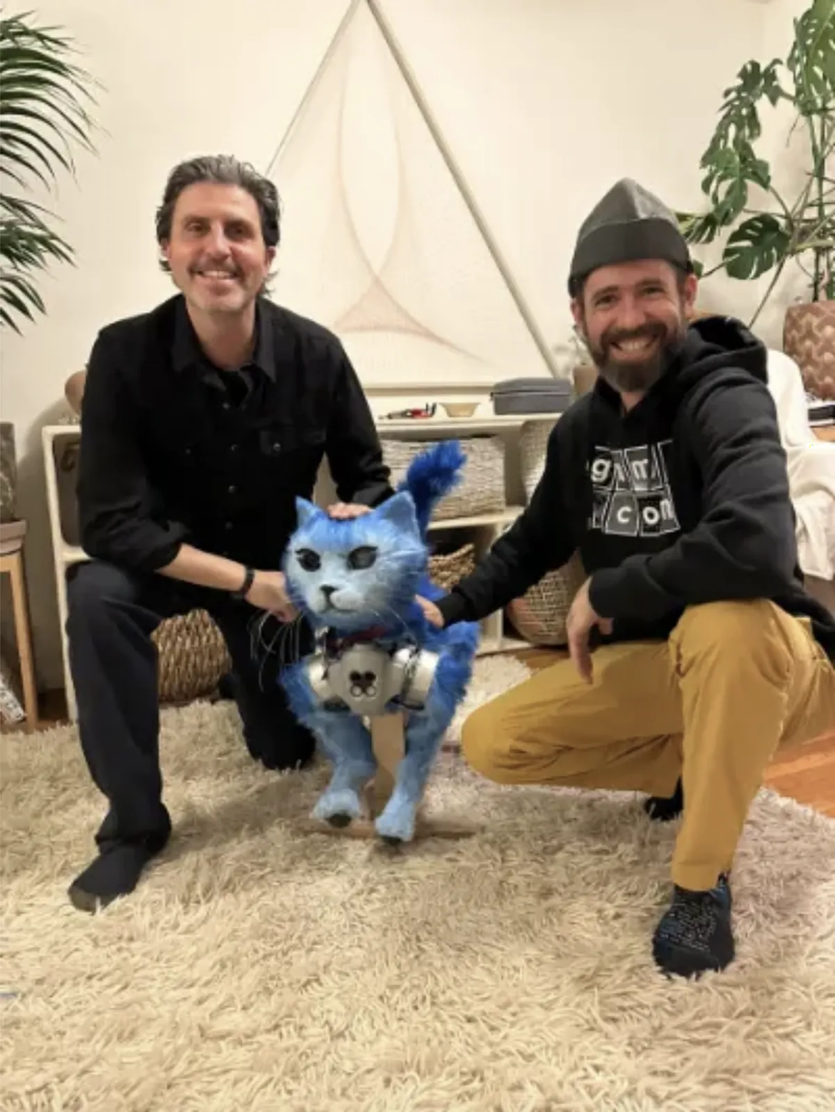 The Nushi robot with its creative team